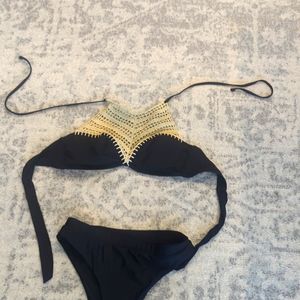 Two-piece women's bathing suit black and tan